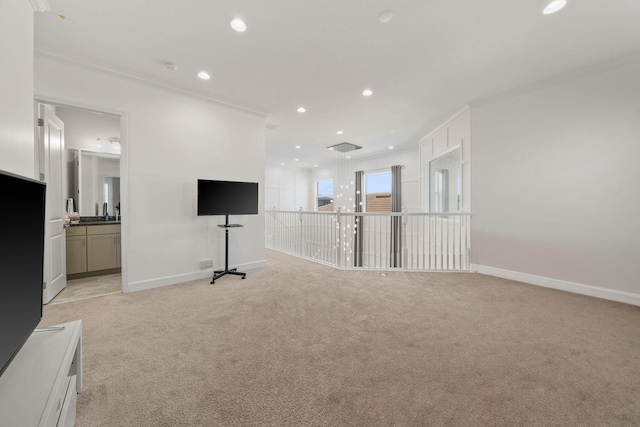 5651 Macoon Way, Westlake, FL 33470 - unfurnished living room featuring crown molding, light carpet, baseboards, and recessed lighting