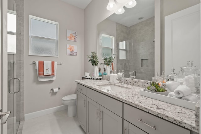 5651 Macoon Way, Westlake, FL 33470 - bathroom with baseboards, a shower stall, toilet, and healthy amount of natural light