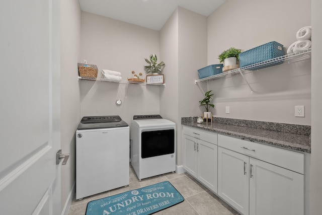 5651 Macoon Way, Westlake, FL 33470 - laundry room featuring washing machine and dryer, light tile patterned floors, and baseboards