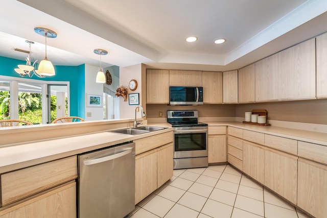kitchen with a sink, stainless steel appliances, light brown cabinets, and light tile patterned floors