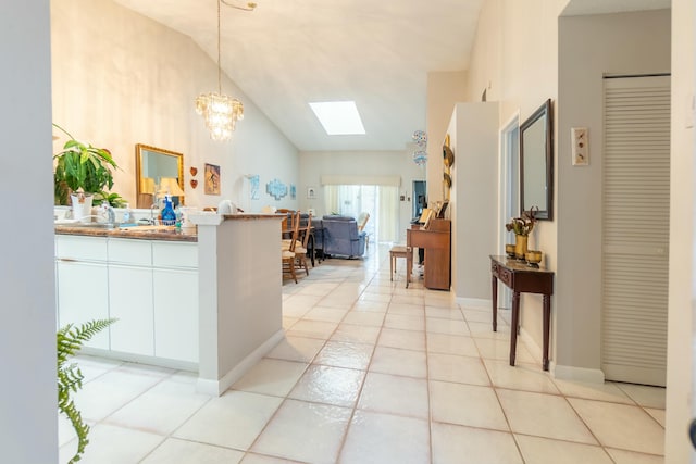 8306 Summersong Ter Unit B, Boca Raton, FL 33496 - welcome area with a skylight and a notable chandelier