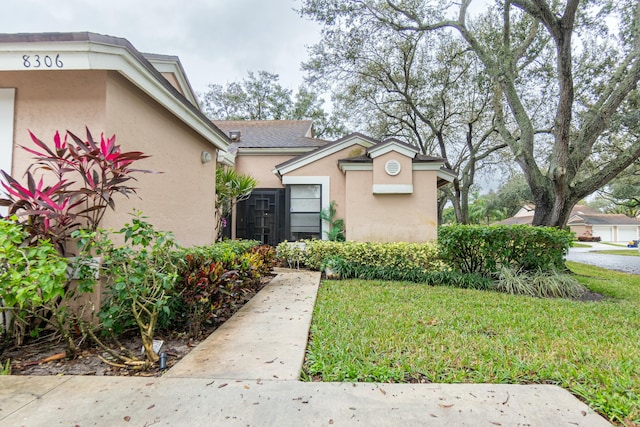 8306 Summersong Ter Unit B, Boca Raton, FL 33496 - exterior space featuring stucco siding