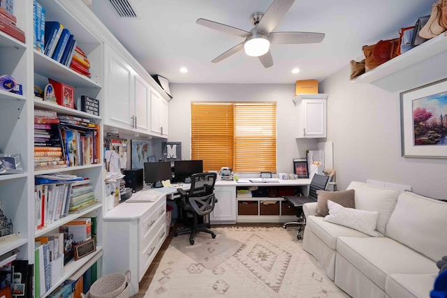 office with ceiling fan and recessed lighting