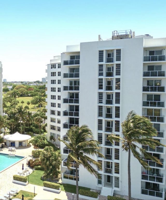 2800 N Flagler Dr Unit 410, West Palm Beach, FL 33407 - view of building exterior featuring a community pool