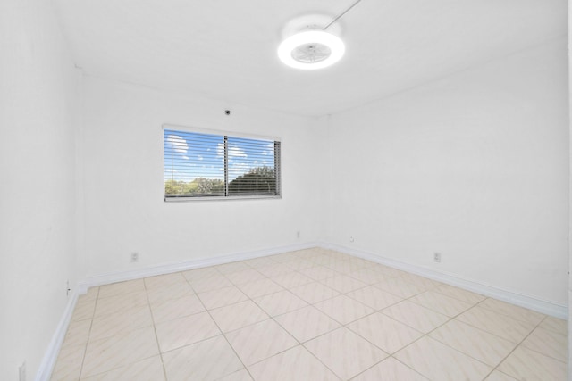 empty room with baseboards