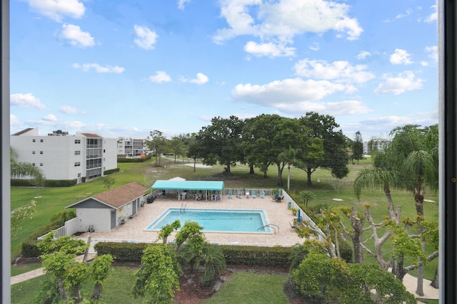 community pool with a patio