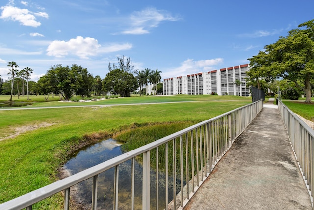 view of home's community featuring a yard