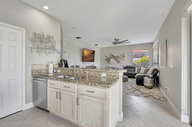 12774 Spikerush Cir, Boca Raton, FL 33428 - kitchen featuring a sink, a peninsula, open floor plan, light tile patterned floors, and stainless steel dishwasher