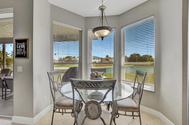 12774 Spikerush Cir, Boca Raton, FL 33428 - dining room featuring baseboards and light tile patterned flooring