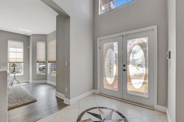12774 Spikerush Cir, Boca Raton, FL 33428 - foyer entrance with baseboards, french doors, and a healthy amount of sunlight
