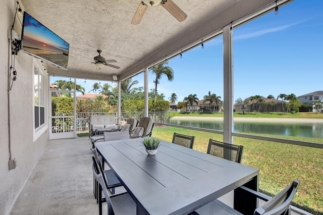 12774 Spikerush Cir, Boca Raton, FL 33428 - view of patio featuring outdoor dining area, a water view, and a ceiling fan