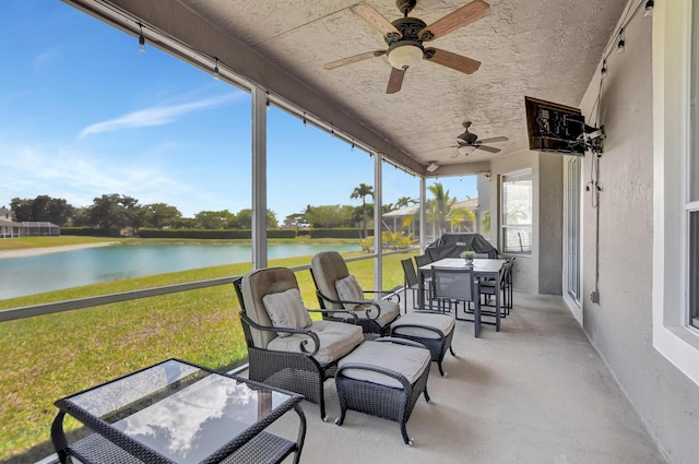 12774 Spikerush Cir, Boca Raton, FL 33428 - sunroom featuring outdoor dining space, a water view, and ceiling fan