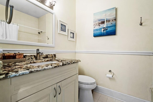full bath with toilet, a shower with curtain, vanity, tile patterned flooring, and baseboards