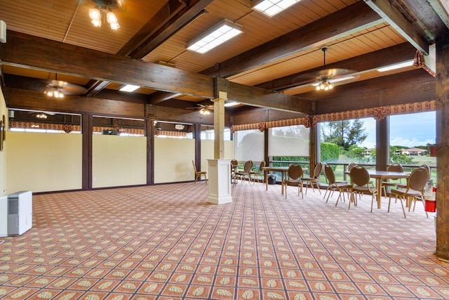 view of patio / terrace with a ceiling fan and outdoor dining space