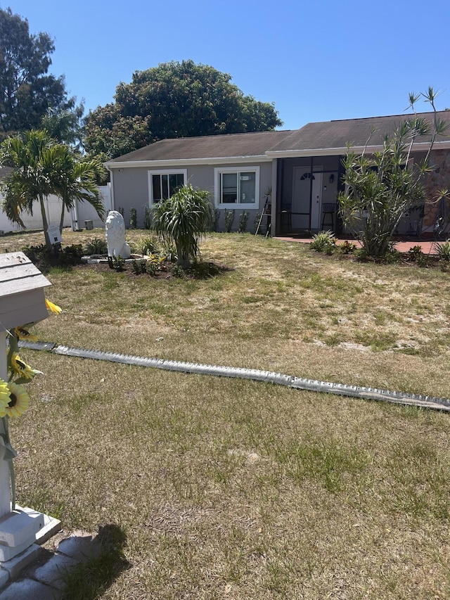 252 SW Cherryhill Rd, Port Saint Lucie, FL 34953 - view of front facade with a fenced backyard