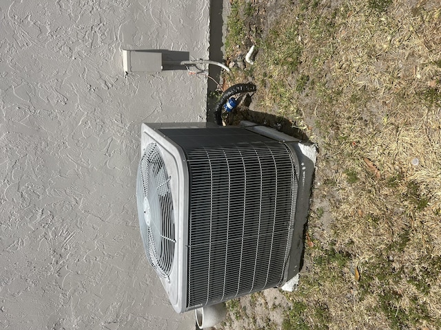 252 SW Cherryhill Rd, Port Saint Lucie, FL 34953 - details with stucco siding and ac unit