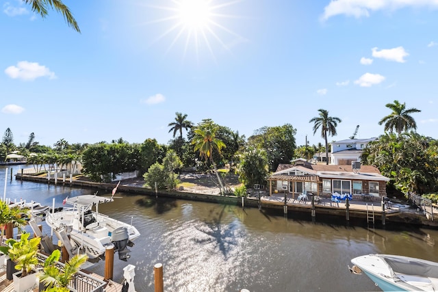 dock featuring a water view and boat lift