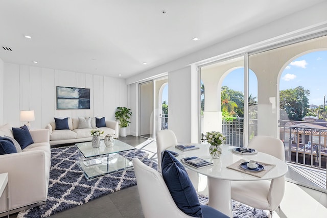 living room featuring a decorative wall