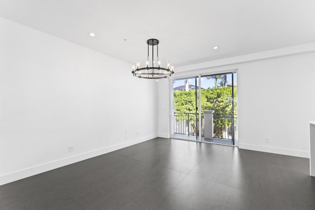 spare room with baseboards, a chandelier, and recessed lighting