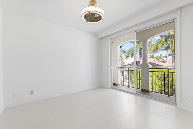 view of tiled spare room