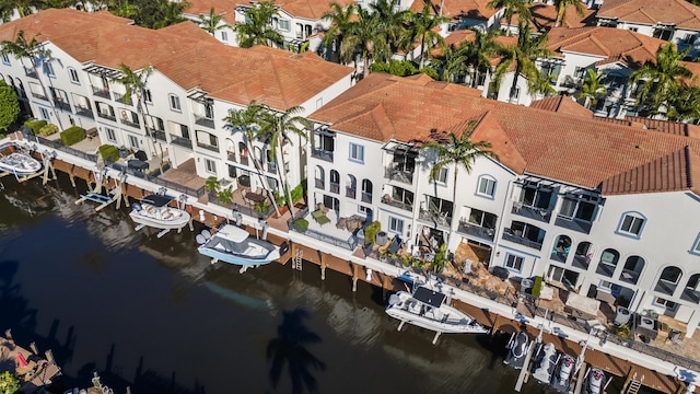 aerial view of residential area with a nearby body of water