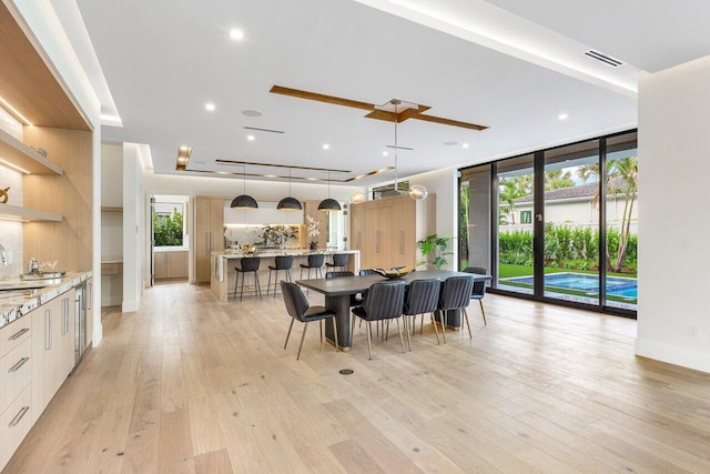 1445 NE 5th Ave, Boca Raton, FL 33432 - dining area featuring plenty of natural light, light wood-style floors, and recessed lighting