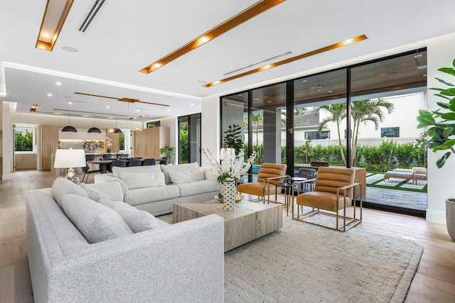 1445 NE 5th Ave, Boca Raton, FL 33432 - living area featuring light wood-style flooring