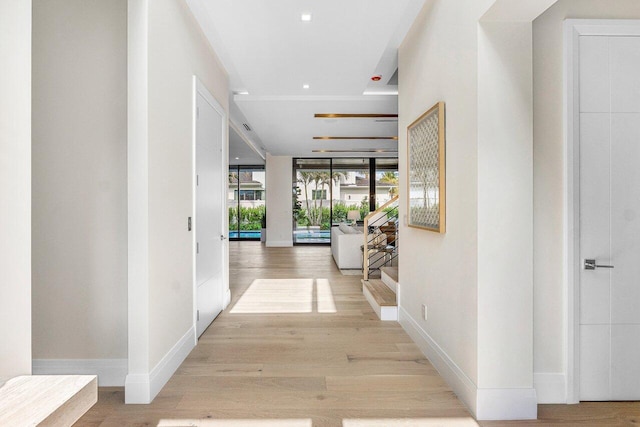 1445 NE 5th Ave, Boca Raton, FL 33432 - hall featuring wood finished floors and baseboards