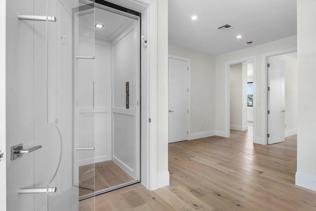 1445 NE 5th Ave, Boca Raton, FL 33432 - bathroom featuring wood finished floors, baseboards, and recessed lighting