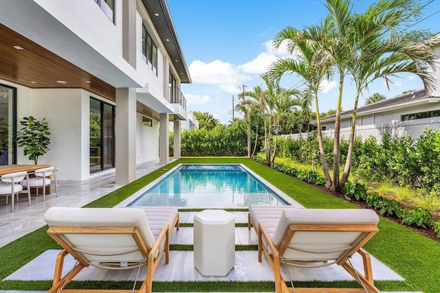 1445 NE 5th Ave, Boca Raton, FL 33432 - view of swimming pool with a patio and a fenced backyard