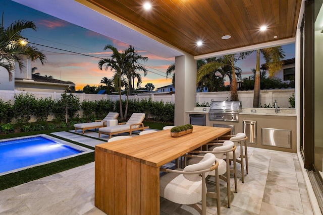 1445 NE 5th Ave, Boca Raton, FL 33432 - view of patio / terrace with area for grilling, a fenced backyard, and outdoor dining area