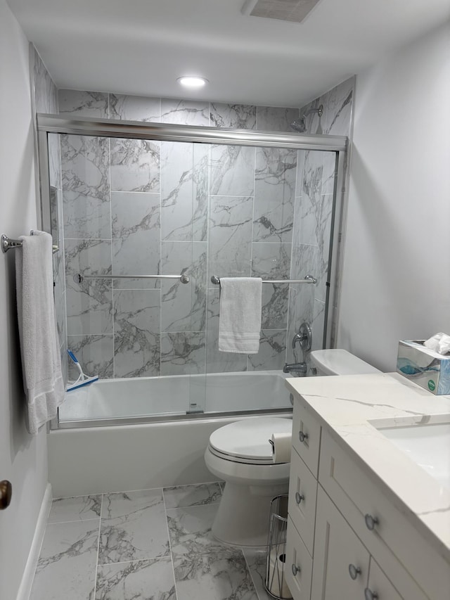 825 Egret Cir Unit 205, Delray Beach, FL 33444 - full bath featuring enclosed tub / shower combo, toilet, marble look tiles, and vanity