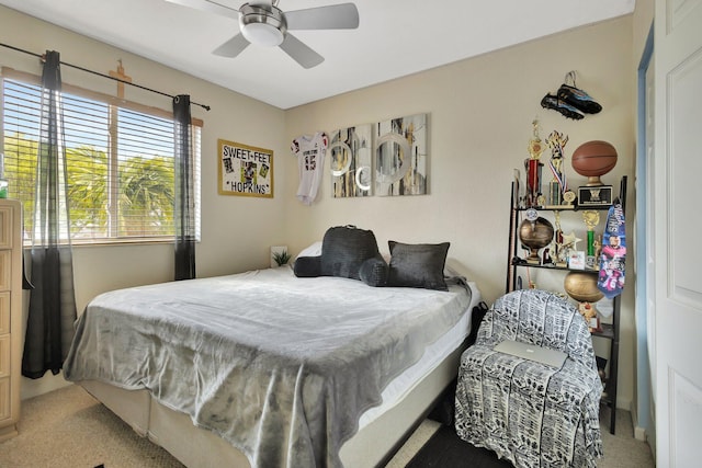 2125 Oakmont Dr, Riviera Beach, FL 33404 - bedroom with ceiling fan and light carpet