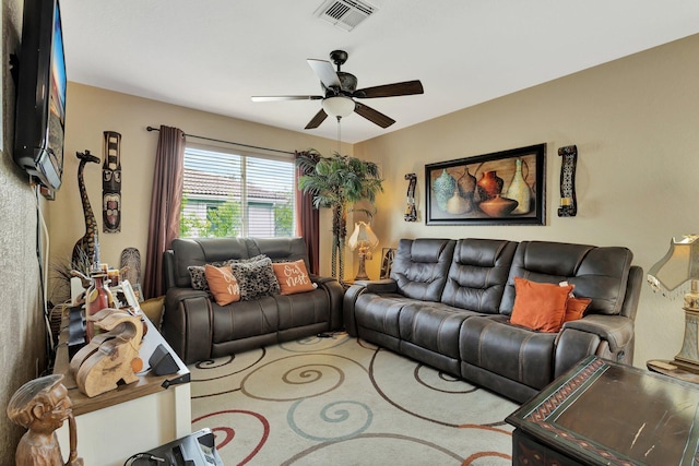 2125 Oakmont Dr, Riviera Beach, FL 33404 - carpeted living area with visible vents and a ceiling fan