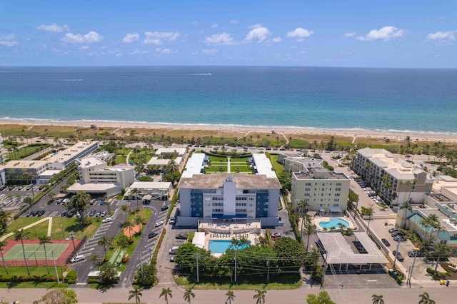 aerial view of unending shoreline and a pool