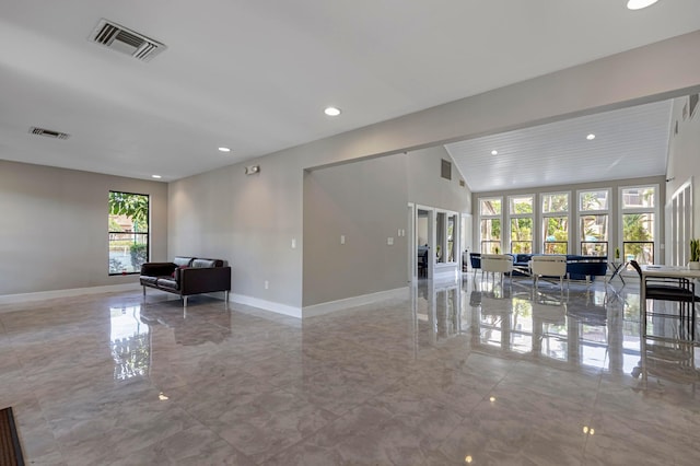 community lobby featuring recessed lighting and vaulted ceiling