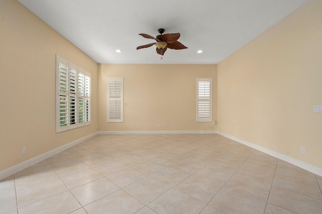 unfurnished room with light tile patterned floors, baseboards, ceiling fan, and recessed lighting