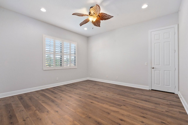 empty room featuring a ceiling fan, dark wood-style flooring, and recessed lighting