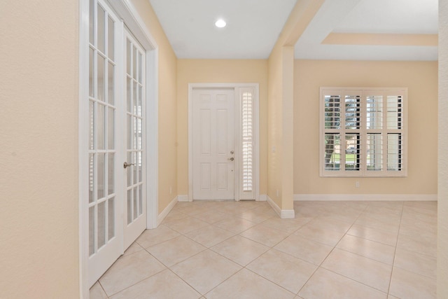 foyer with french doors, tile patterned flooring, baseboards, and recessed lighting