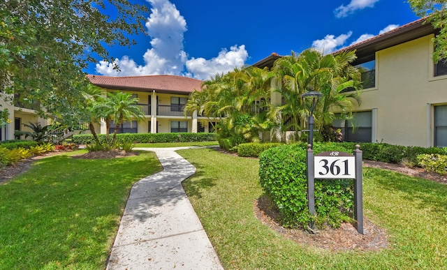 surrounding community with a lawn