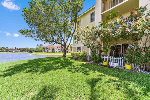 4240 San Marino Blvd Unit 108, West Palm Beach, FL 33409 - view of green lawn featuring a water view
