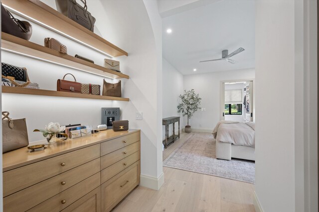 bedroom with light wood-style flooring, baseboards, and recessed lighting