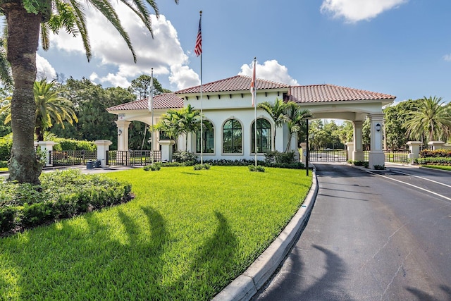 1785 Flagler Manor Cir, West Palm Beach, FL 33411 - view of building exterior with driveway