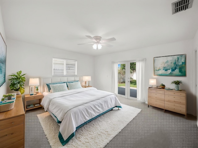 carpeted bedroom with access to outside, french doors, and a ceiling fan
