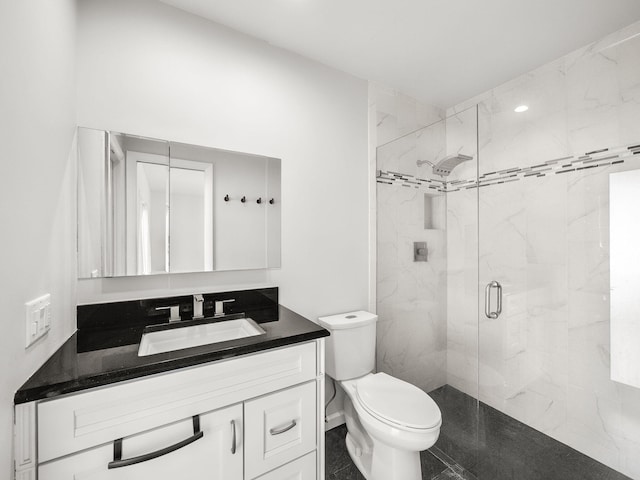 full bath with toilet, a shower stall, and vanity