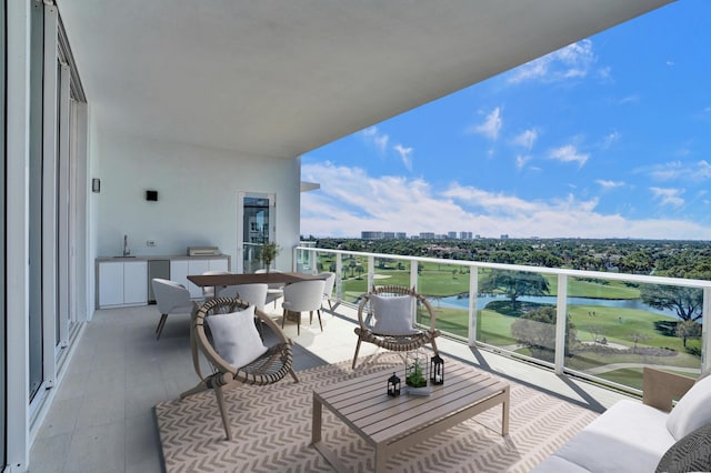 220 SE Mizner Blvd Unit Ph920, Boca Raton, FL 33432 - balcony featuring a water view, a sink, view of golf course, and outdoor dining space