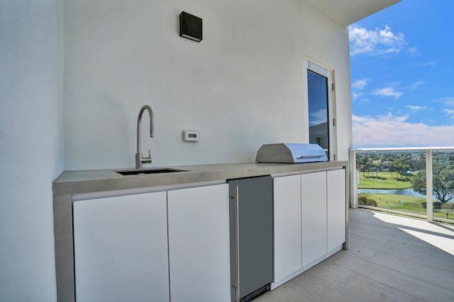220 SE Mizner Blvd Unit Ph920, Boca Raton, FL 33432 - indoor wet bar featuring a water view and high quality fridge