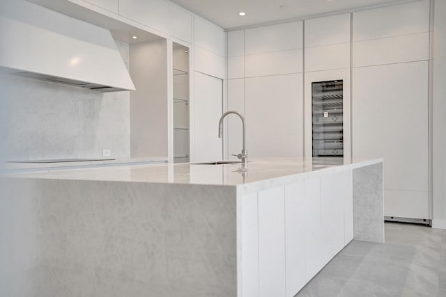 220 SE Mizner Blvd Unit Ph920, Boca Raton, FL 33432 - kitchen featuring modern cabinets, a sink, premium range hood, white cabinets, and recessed lighting