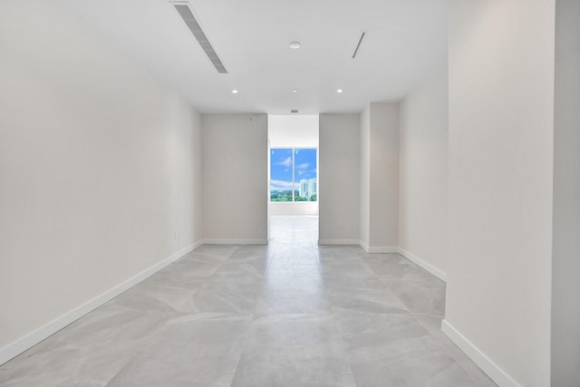 220 SE Mizner Blvd Unit Ph920, Boca Raton, FL 33432 - unfurnished room featuring concrete floors, baseboards, and recessed lighting