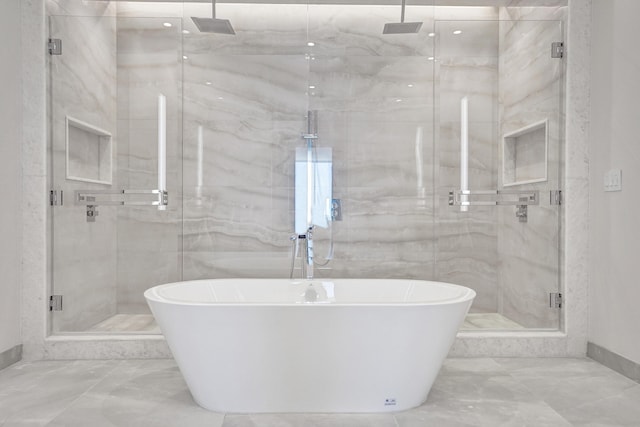 220 SE Mizner Blvd Unit Ph920, Boca Raton, FL 33432 - bathroom featuring marble finish floors, a marble finish shower, and a freestanding tub